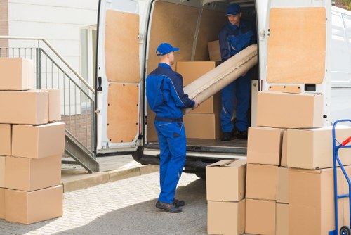 Office removals team planning a move in Putney near local commercial streets
