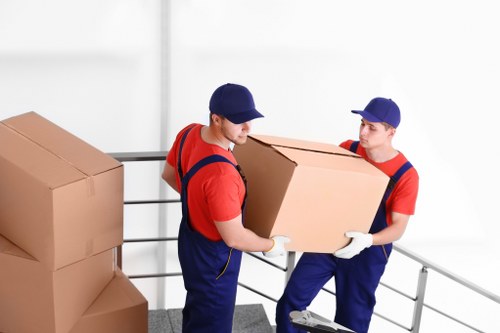 Packing boxes and moving supplies prepared for a Putney home move