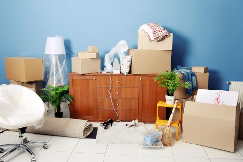 Packed office equipment prepared for a Putney business move