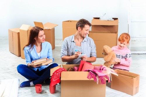 Removal van and moving boxes for a house move in Putney