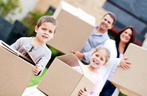 Professional team handling household furniture removal and packing