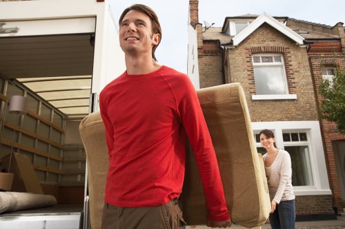 Household items being loaded carefully for removals in Putney