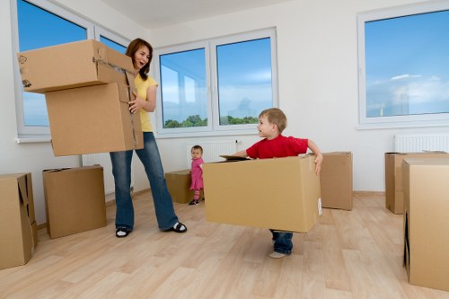 Packed moving boxes loaded into a hire truck