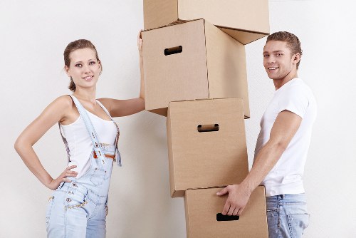 Customer signing a removal service booking confirmation